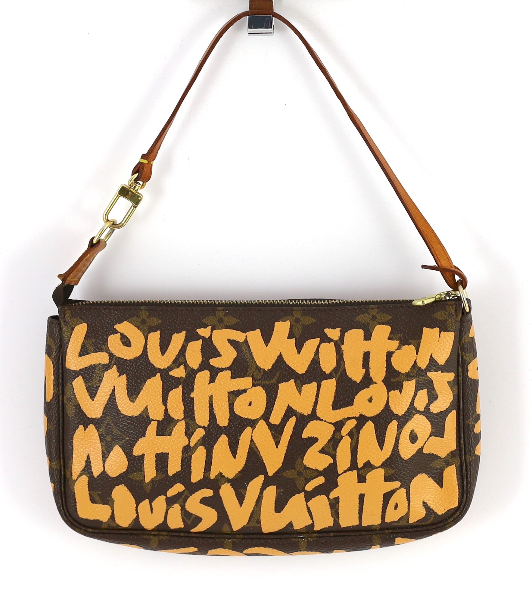 A vintage 2001 Louis Vuitton x Stephen Sprouse Monogram Graffiti Pochette